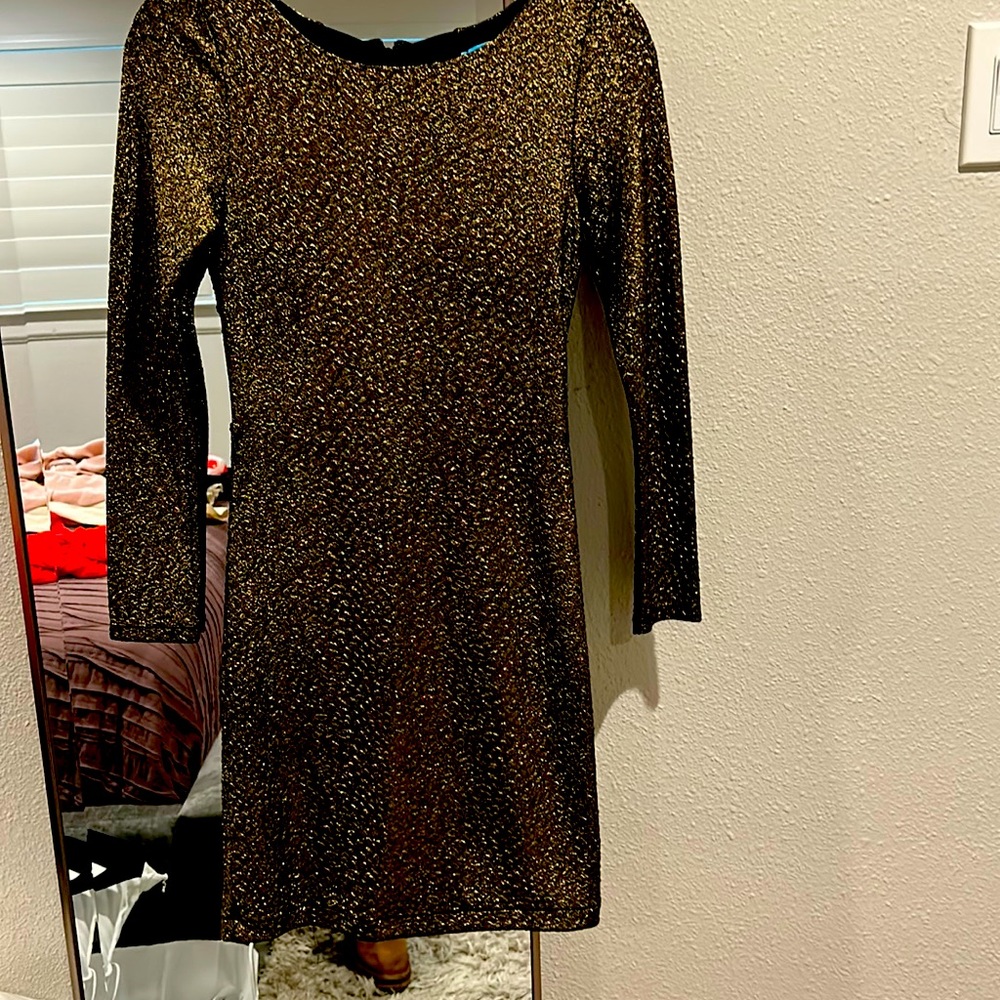 Stunningly gorgeous gold and black body con dress
